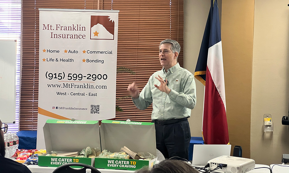 Blog - Man Speaking at the EPAC Lunch & Learn in Front of an Audience